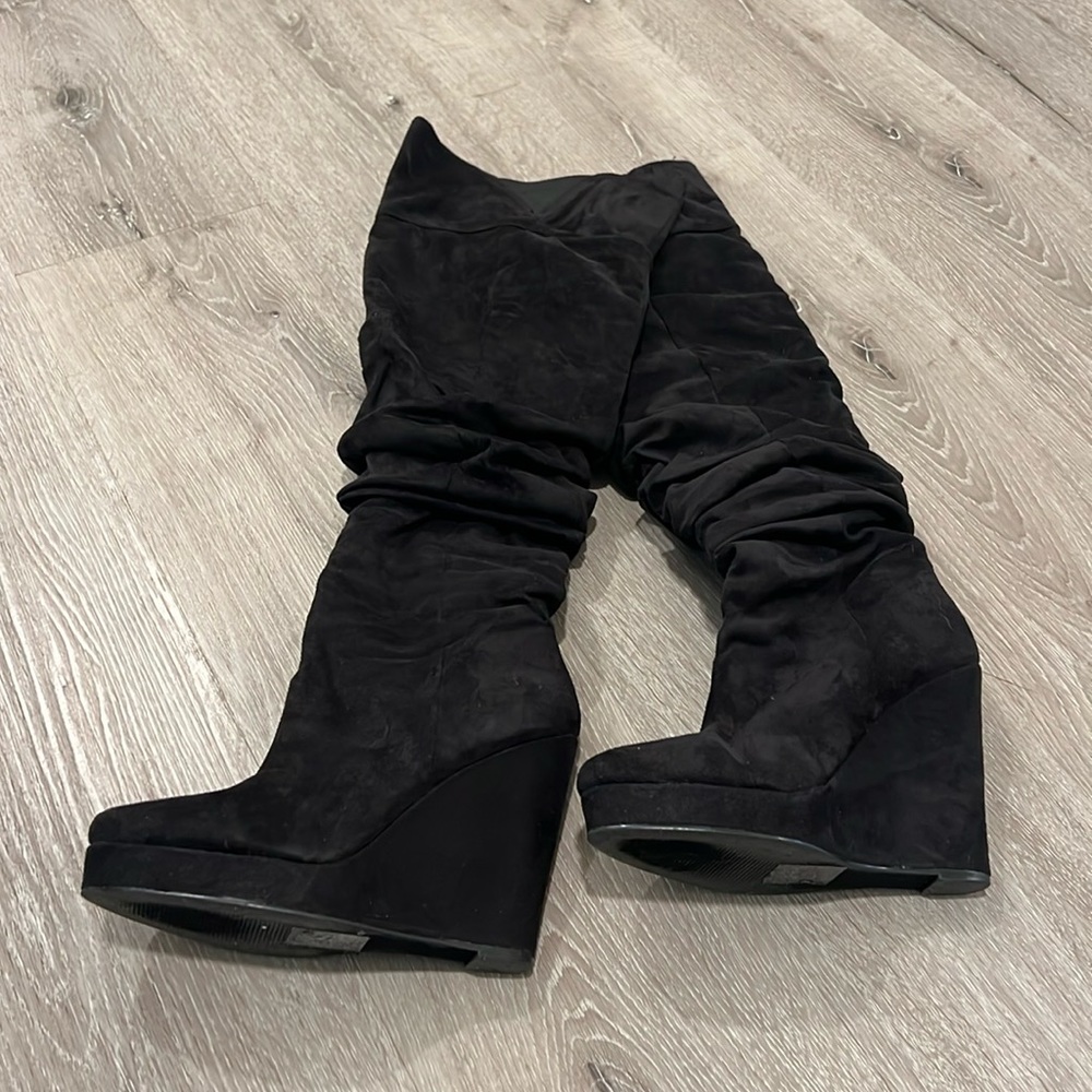 Above the knee wedge boots